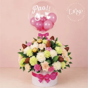 #146 Caja cilindro con claveles, chocolates y globo burbuja