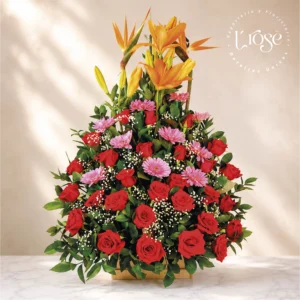 #205 Arreglo floral con rosas, gerberas, ave del paraíso, lirios y bastón