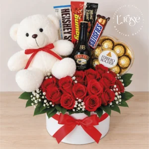 #538 Caja cilindro con rosas, peluche, chocolates y licor