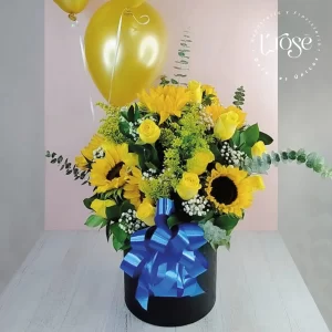 #451 Caja cilindro con flores y globos