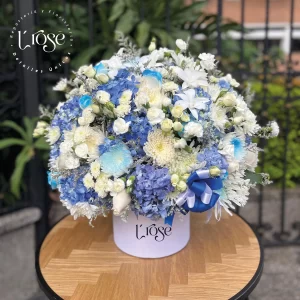 #488 Caja cilindro con flores