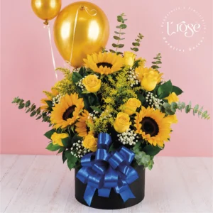 #451 Caja cilindro con flores y globos
