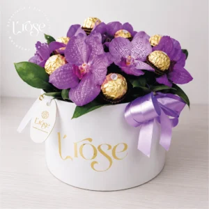 #572 Caja cilindro con Orquídeas